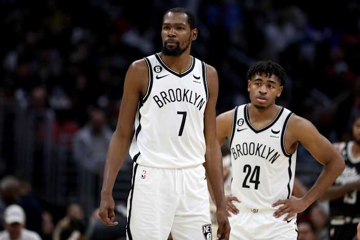 Brooklyn Nets forward Kevin Durant (7) and guard Cam Thomas (24)